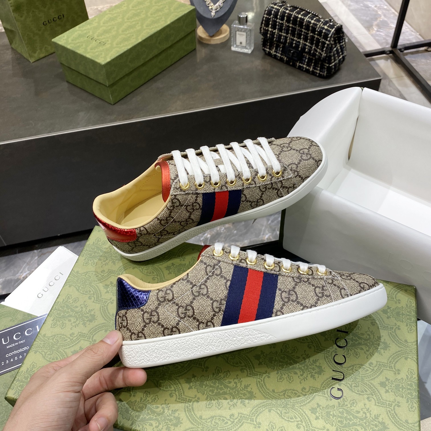 G*u*i sneakers