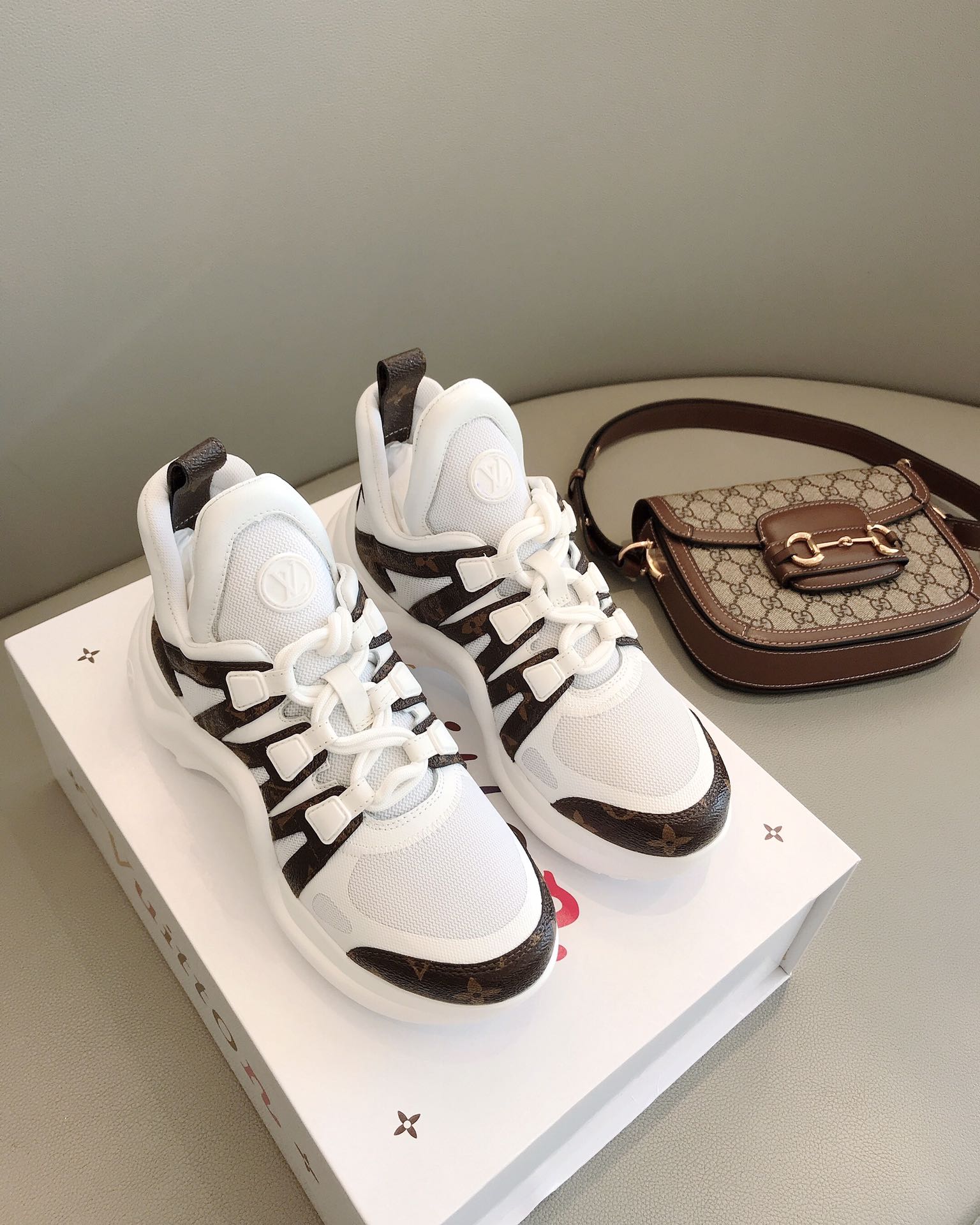 l**is V*t*n archlight sneaker
