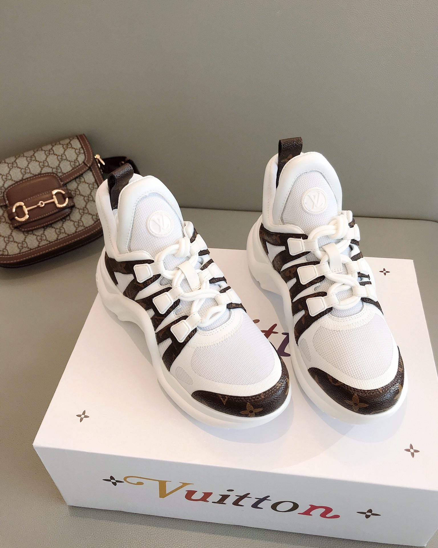 l**is V*t*n archlight sneaker