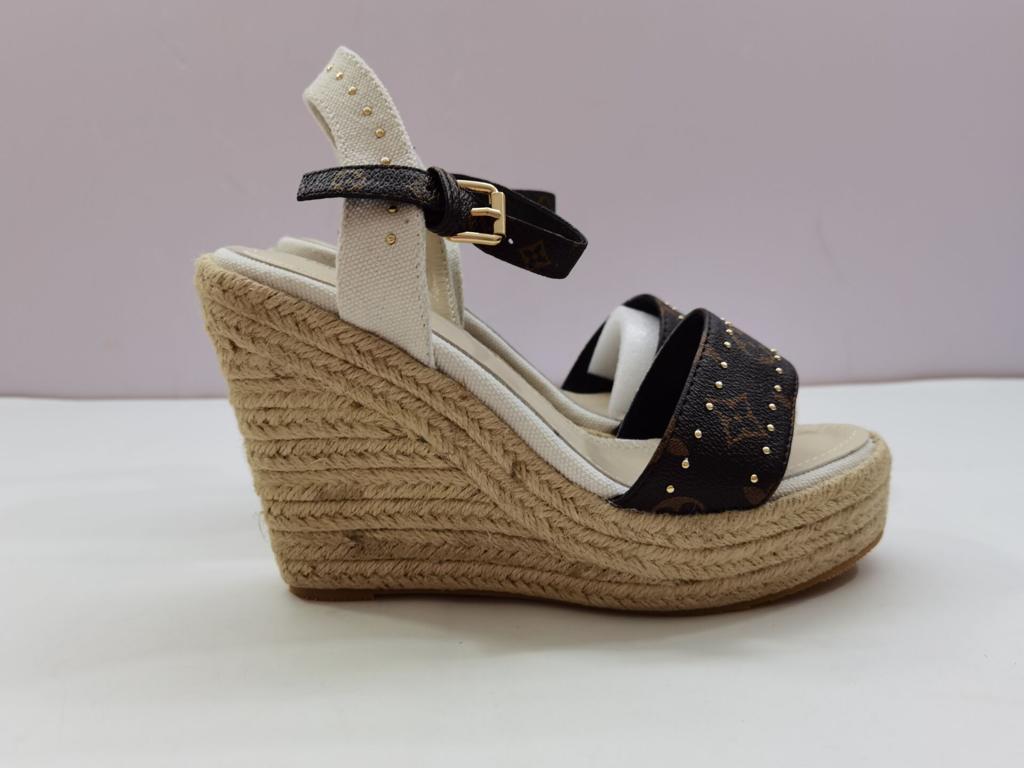 l**is V*t*n sandals