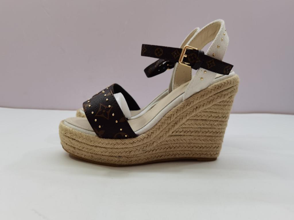 l**is V*t*n sandals
