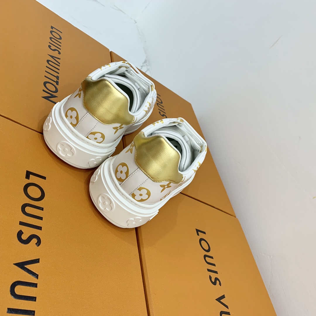 l**is V*t*n low-top sneakers