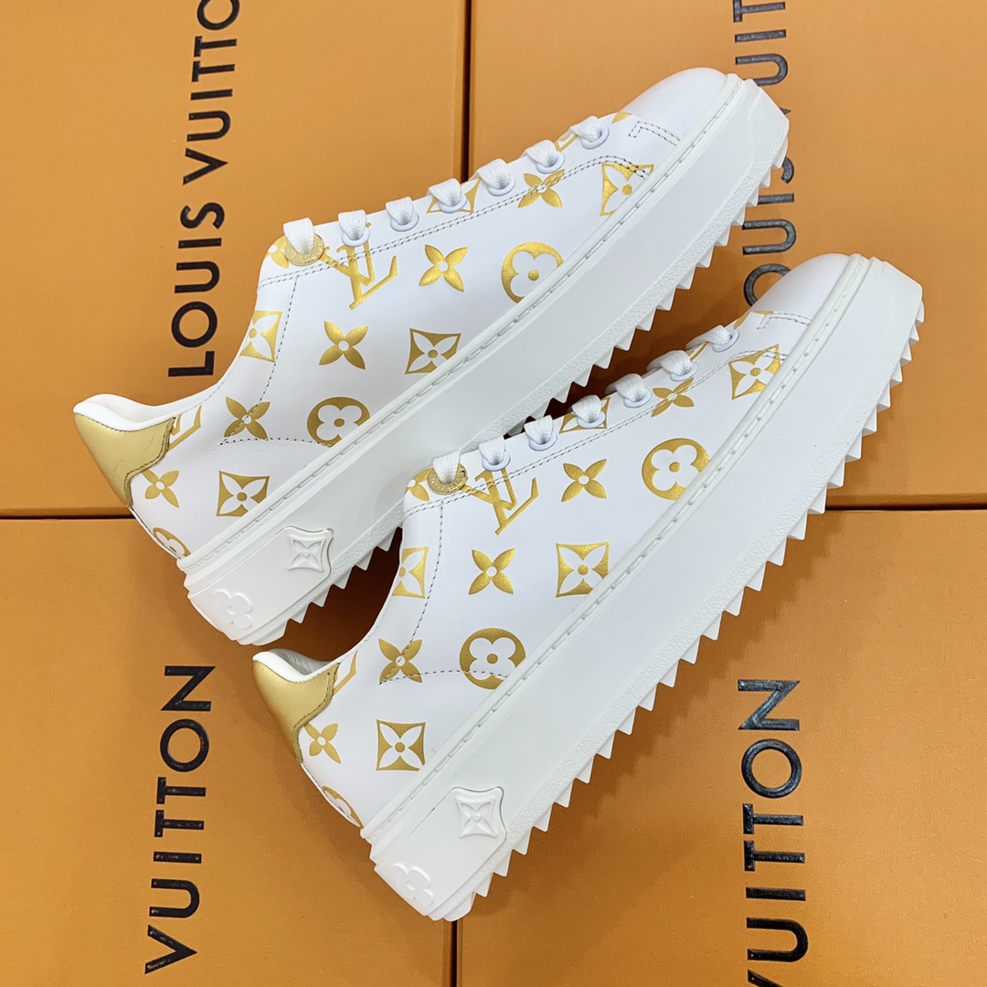 l**is V*t*n low-top sneakers