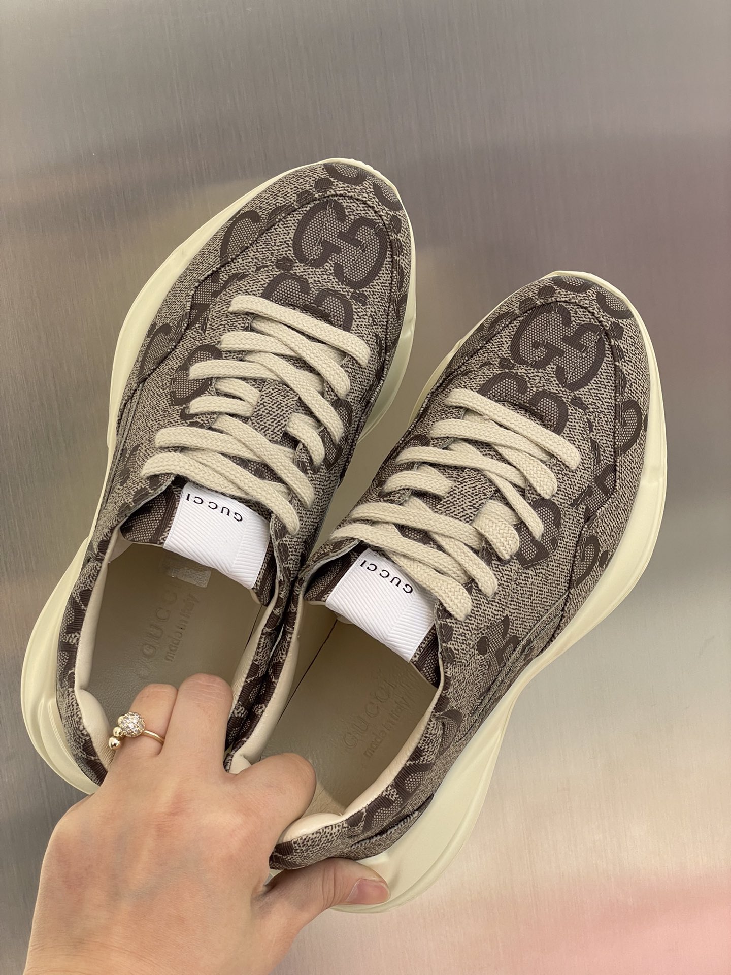 G*u*i sneakers