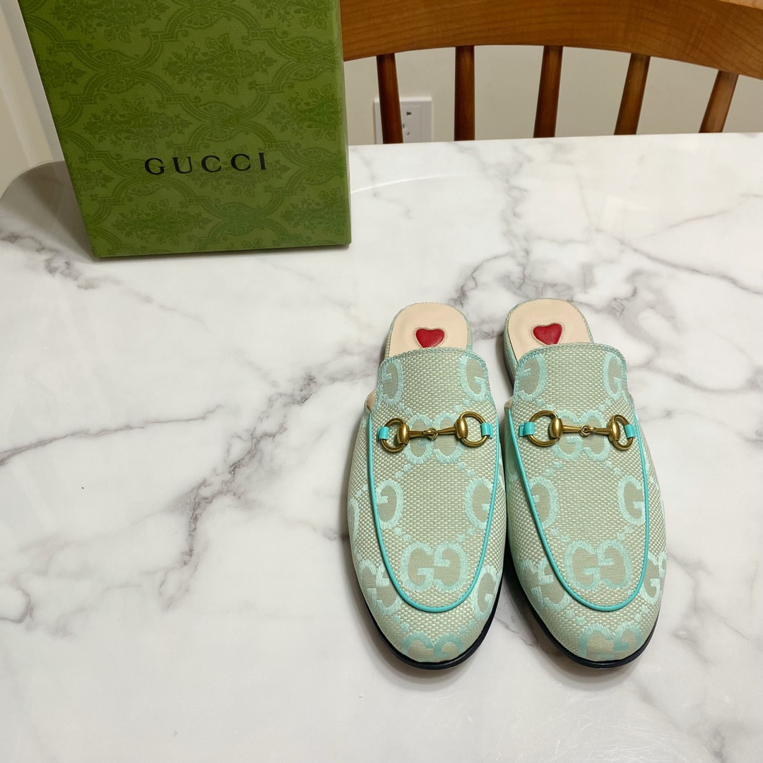G*u*i loafers